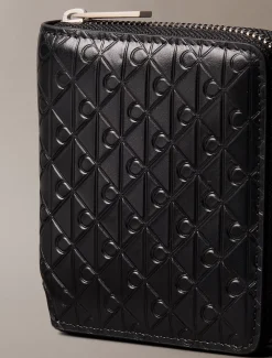 Bifold portemonnee met rits en all-over monogram in reliëf