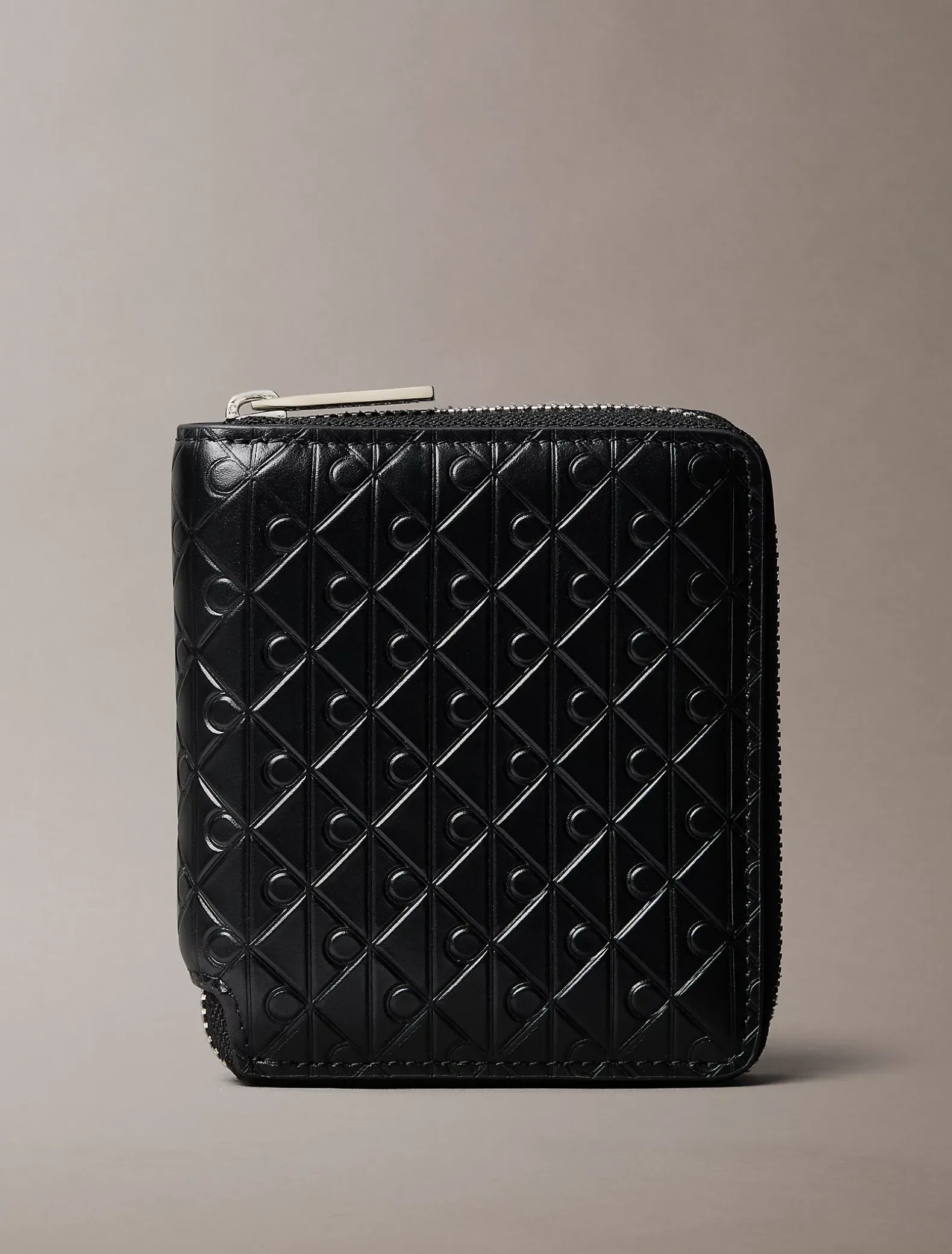 Bifold portemonnee met rits en all-over monogram in reliëf