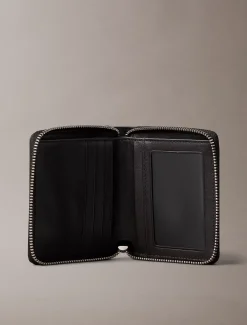 Bifold portemonnee met rits en all-over monogram in reliëf