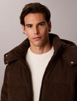 Corduroy donzen pufferjack met capuchon