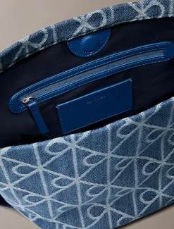 Denim bucket bag met all-over embleemlogo