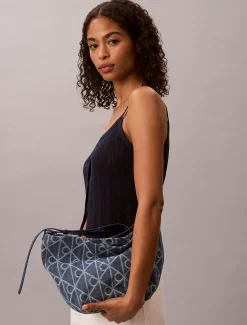 Denim bucket bag met all-over embleemlogo