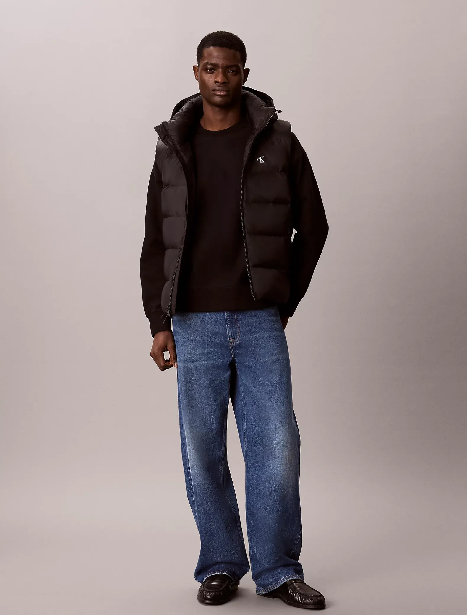Donzen puffer bodywarmer met capuchon