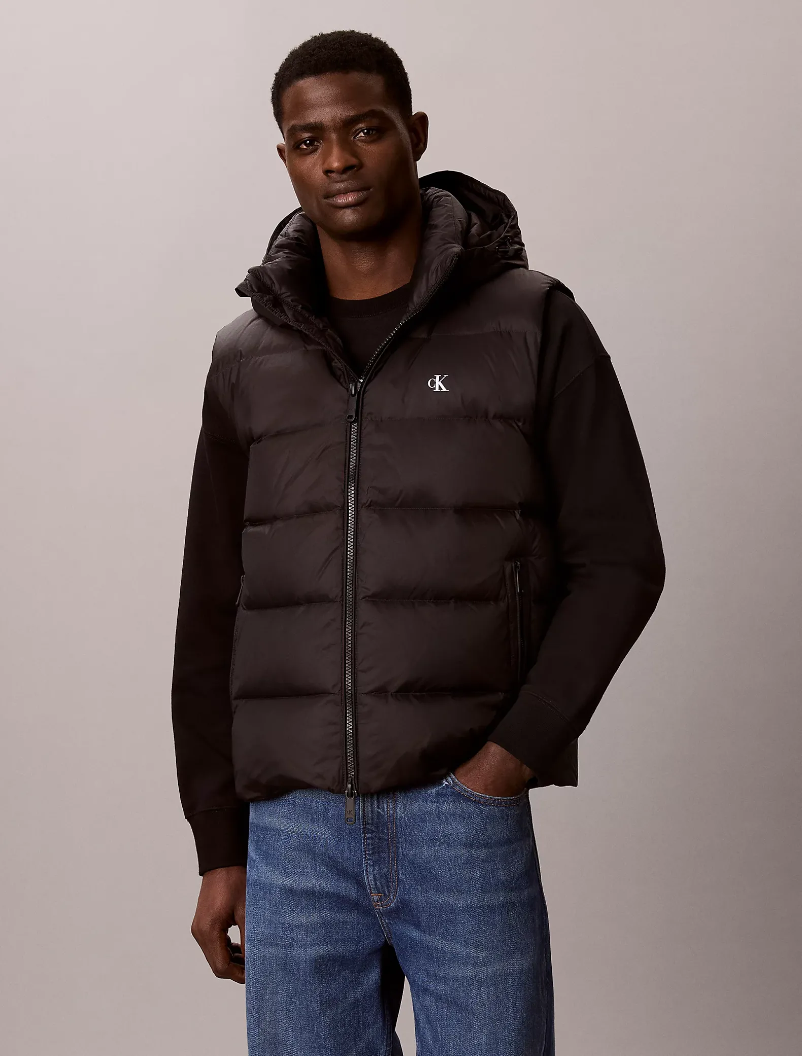Donzen puffer bodywarmer met capuchon