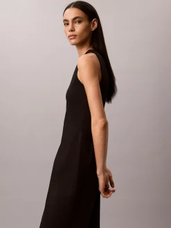 Fit en flare mouwloze halflange jurk