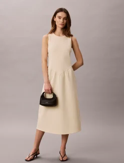 Fit en flare mouwloze halflange jurk