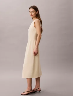 Fit en flare mouwloze halflange jurk