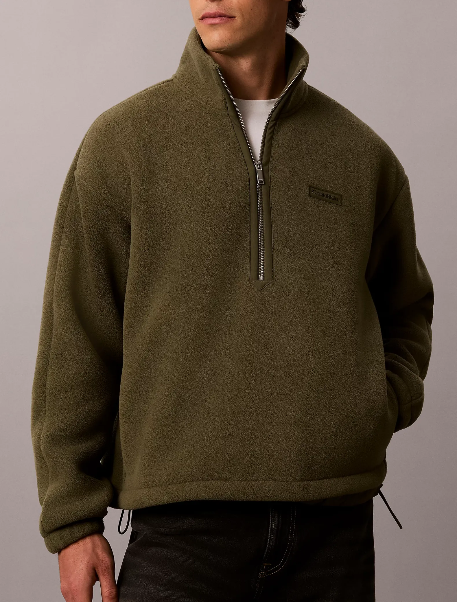 Fleece trui met kwartrits