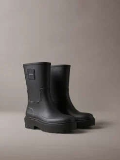 Flexibele regenlaarzen met grove zool en hak
