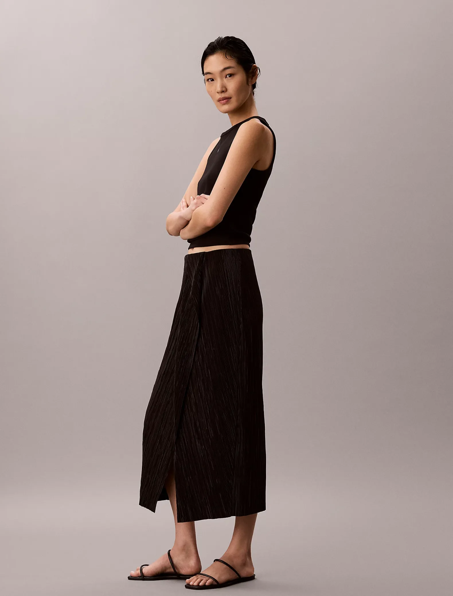 Gedrapeerde plissé midirok