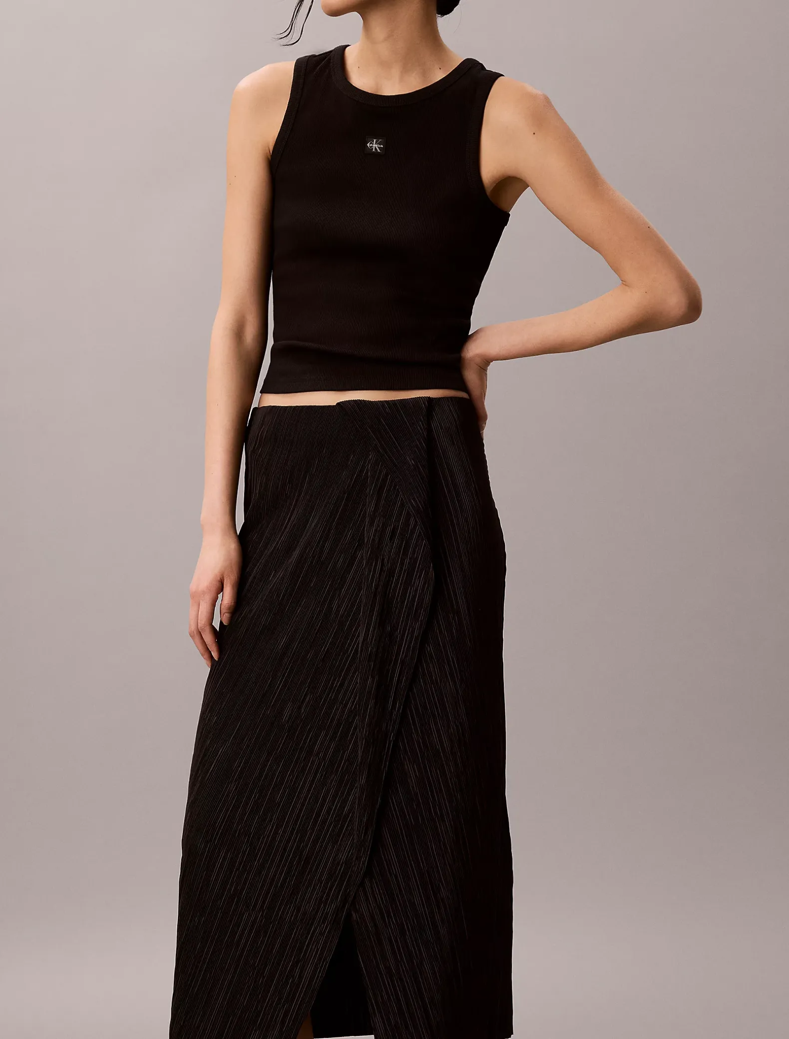Gedrapeerde plissé midirok