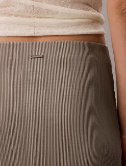 Gedrapeerde plissé midirok