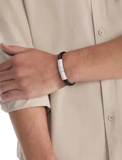 Geometrische armband van leer en staal