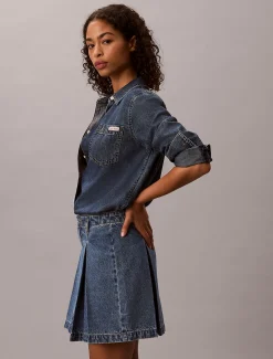 Geplooide denim minirok