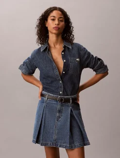 Geplooide denim minirok