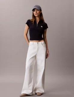 Geribbelde top met rits en monologo patch