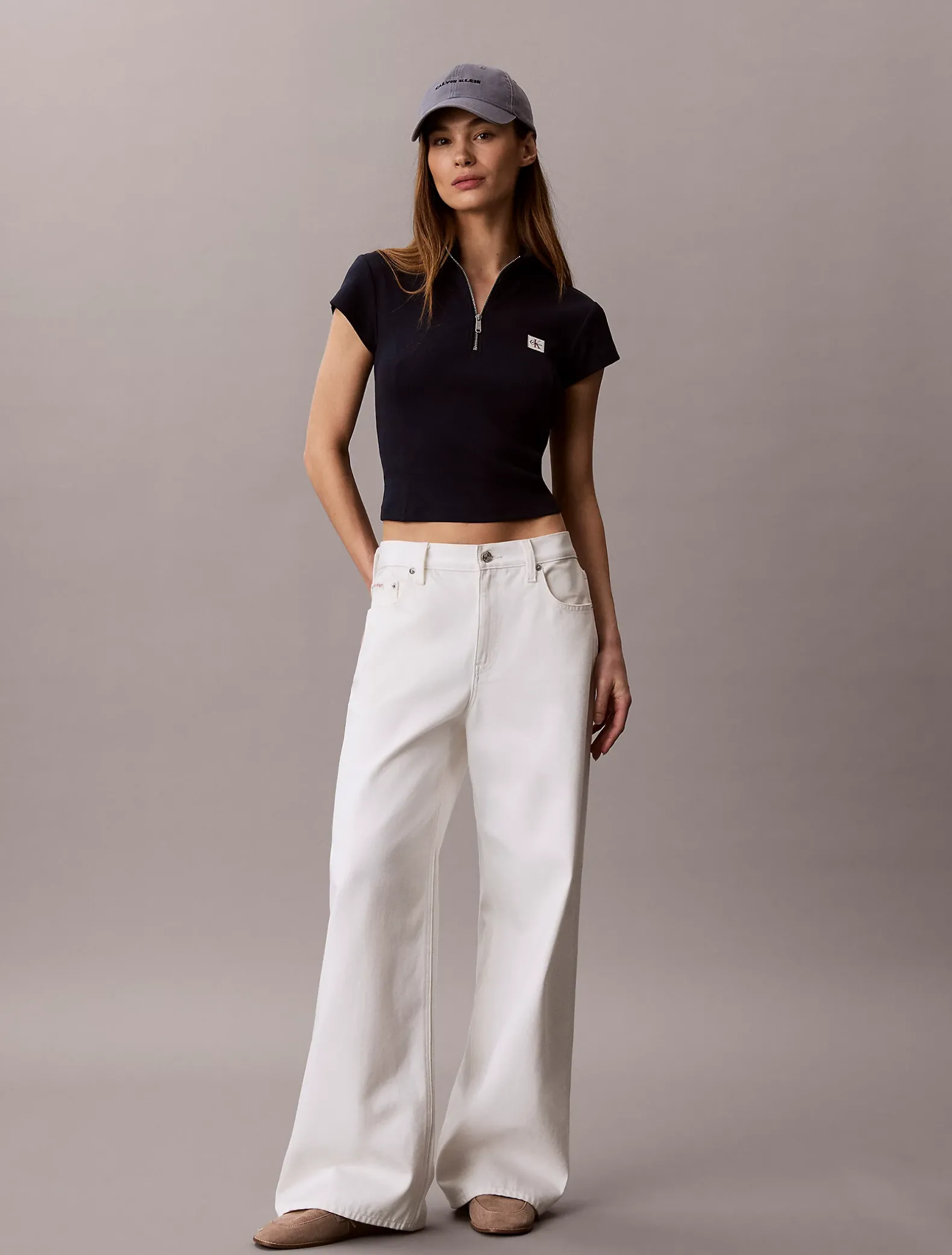 Geribbelde top met rits en monologo patch