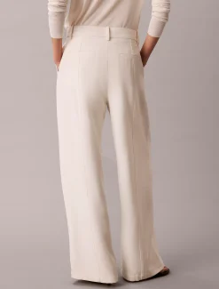 Getextureerde glanzende broek