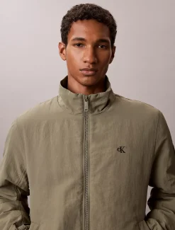 Gewatteerd nylon jack met rits
