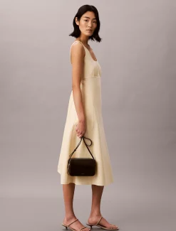 Glanzende crossbody fototas met folielogo
