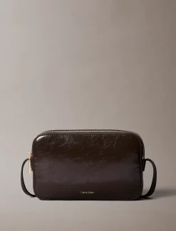 Glanzende crossbody fototas met folielogo