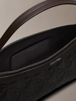 Lange schoudertas met verzonken all-over embleem