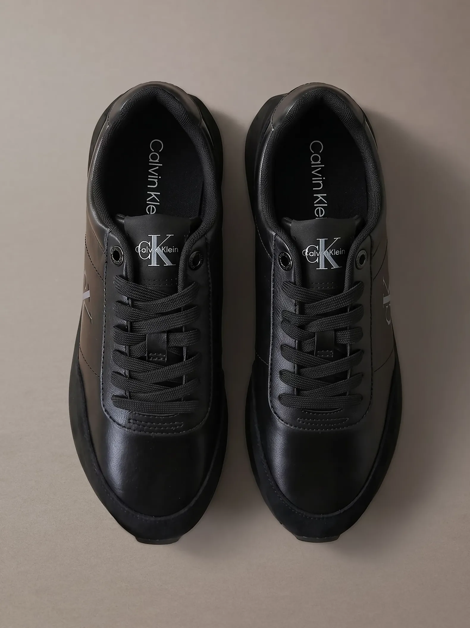 Leren hardloopsneakers met signature logo