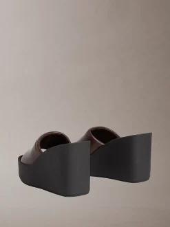 Melia - Leren plateausandalen met sleehak