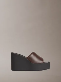 Melia - Leren plateausandalen met sleehak