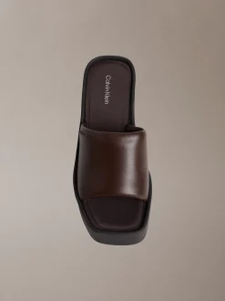 Melia - Leren plateausandalen met sleehak