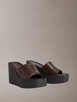 Melia - Leren plateausandalen met sleehak