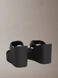 Melia - Leren plateausandalen met sleehak