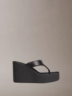 Melia - Leren plateausandalen met sleehak
