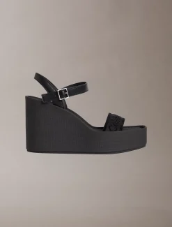 Melia - Plateausandalen met logo en sleehak