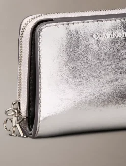 Metallic portemonnee met monogram en rits