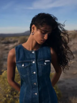 Mouwloze denim truckerjurk