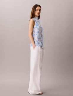 Mouwloze plissé top met hooggesloten hals en print