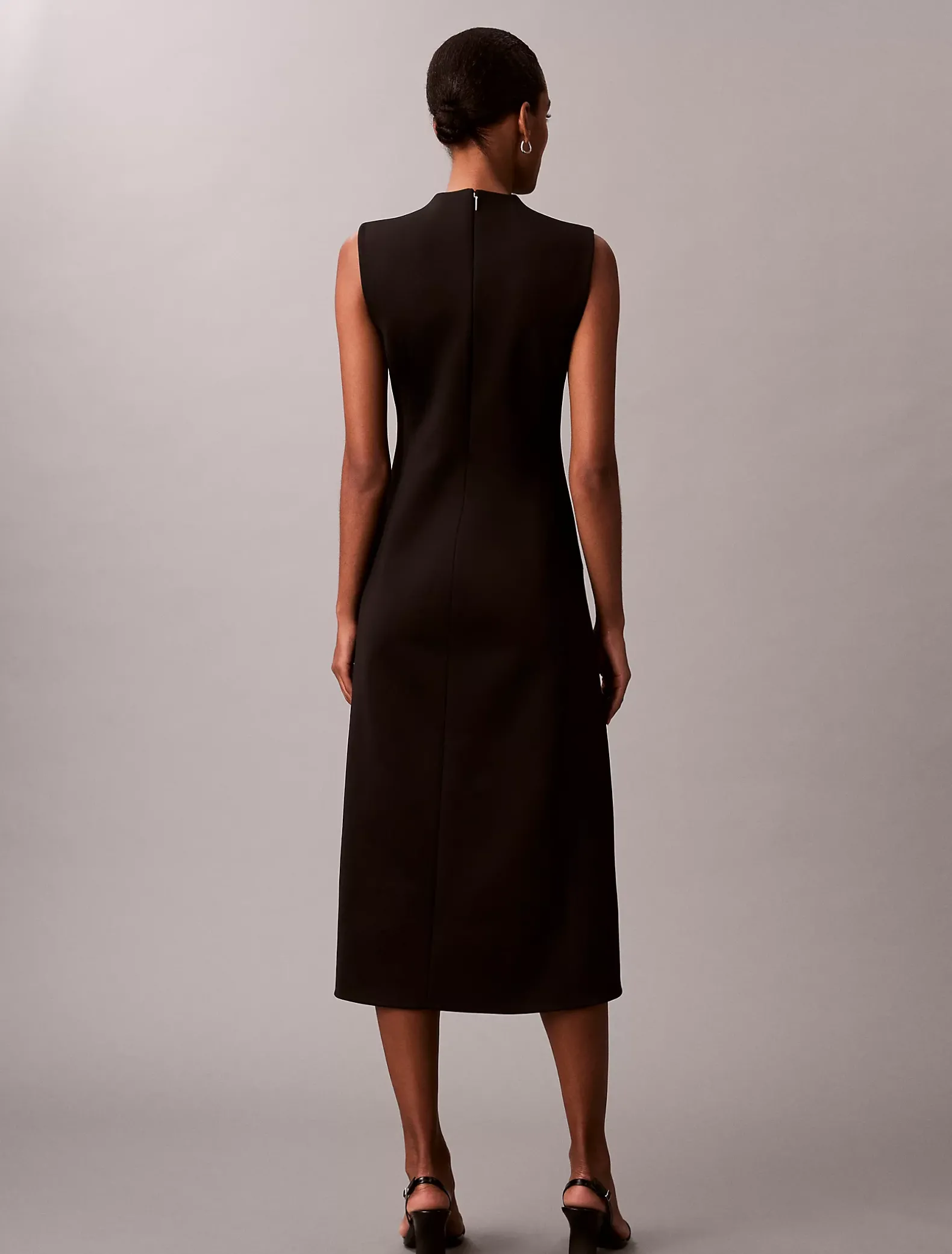 Mouwloze stretch fit en flare jurk