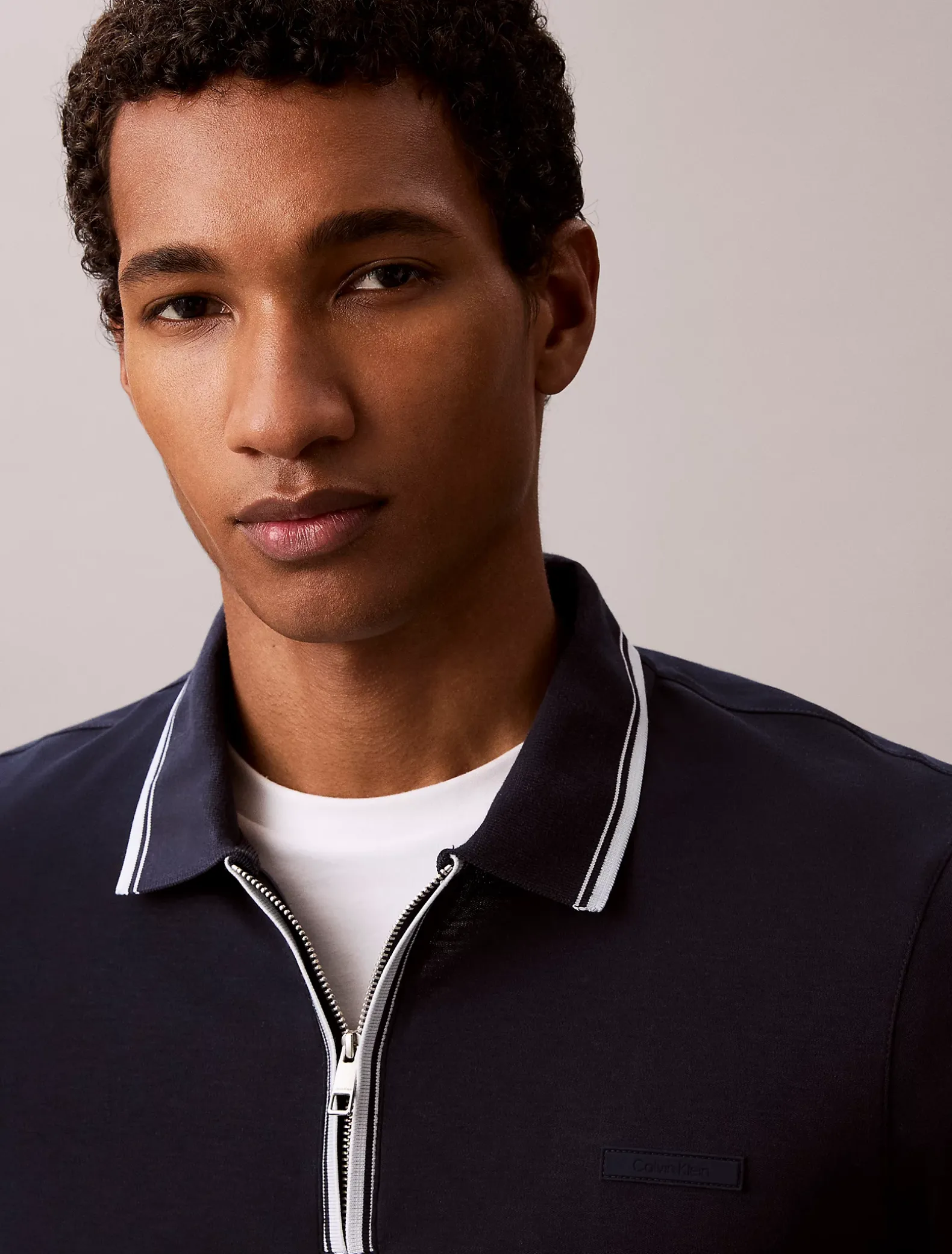 Nauwsluitend katoenen poloshirt met rits
