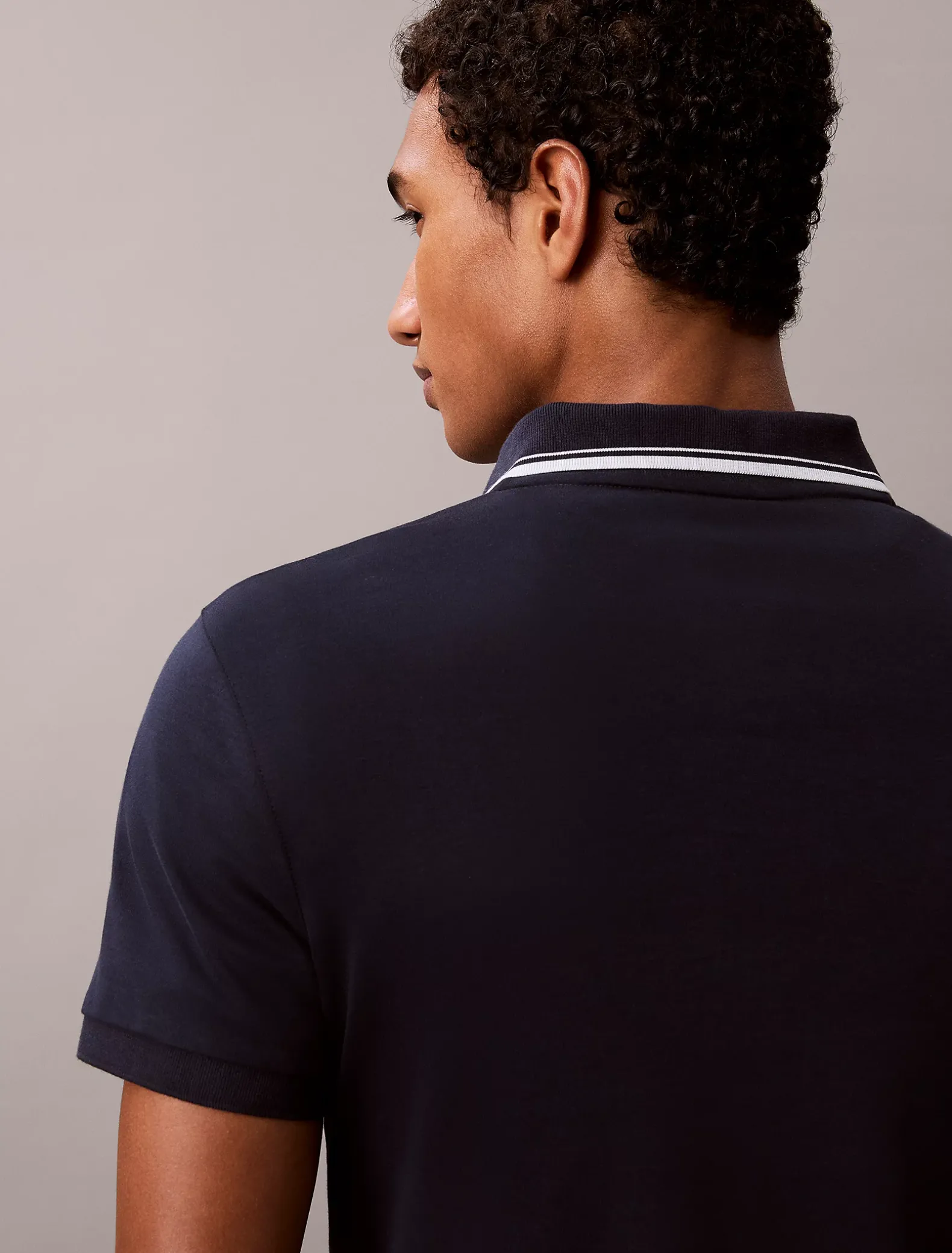 Nauwsluitend katoenen poloshirt met rits