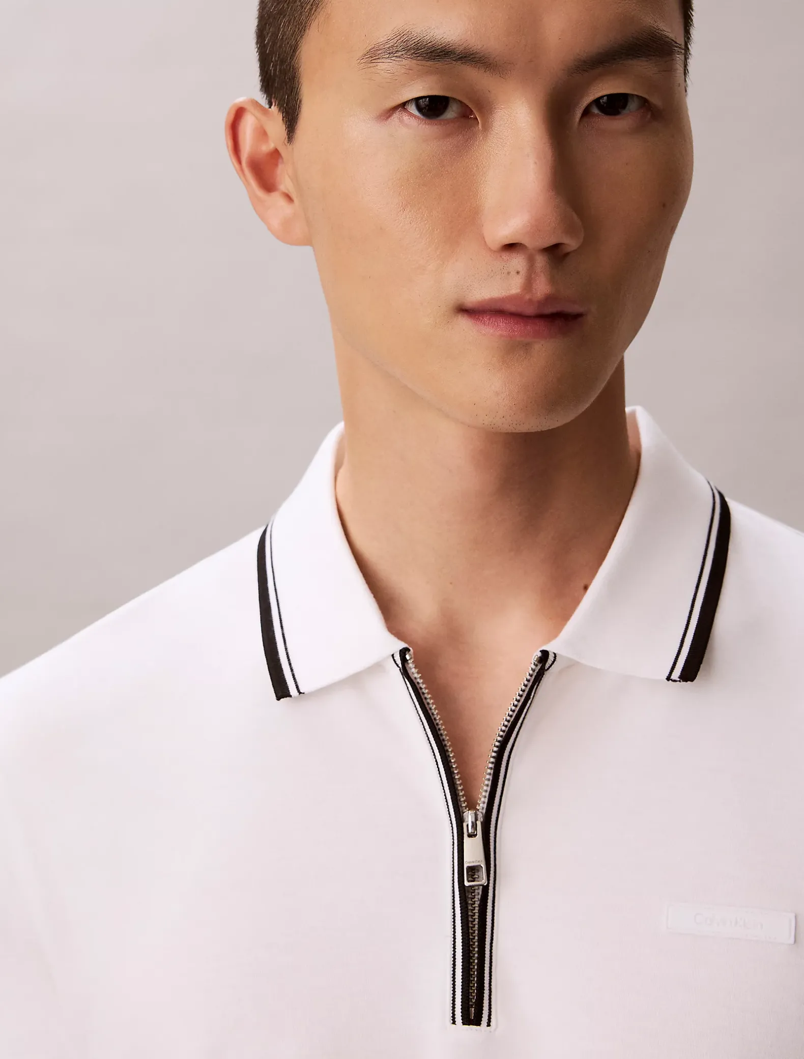 Nauwsluitend katoenen poloshirt met rits
