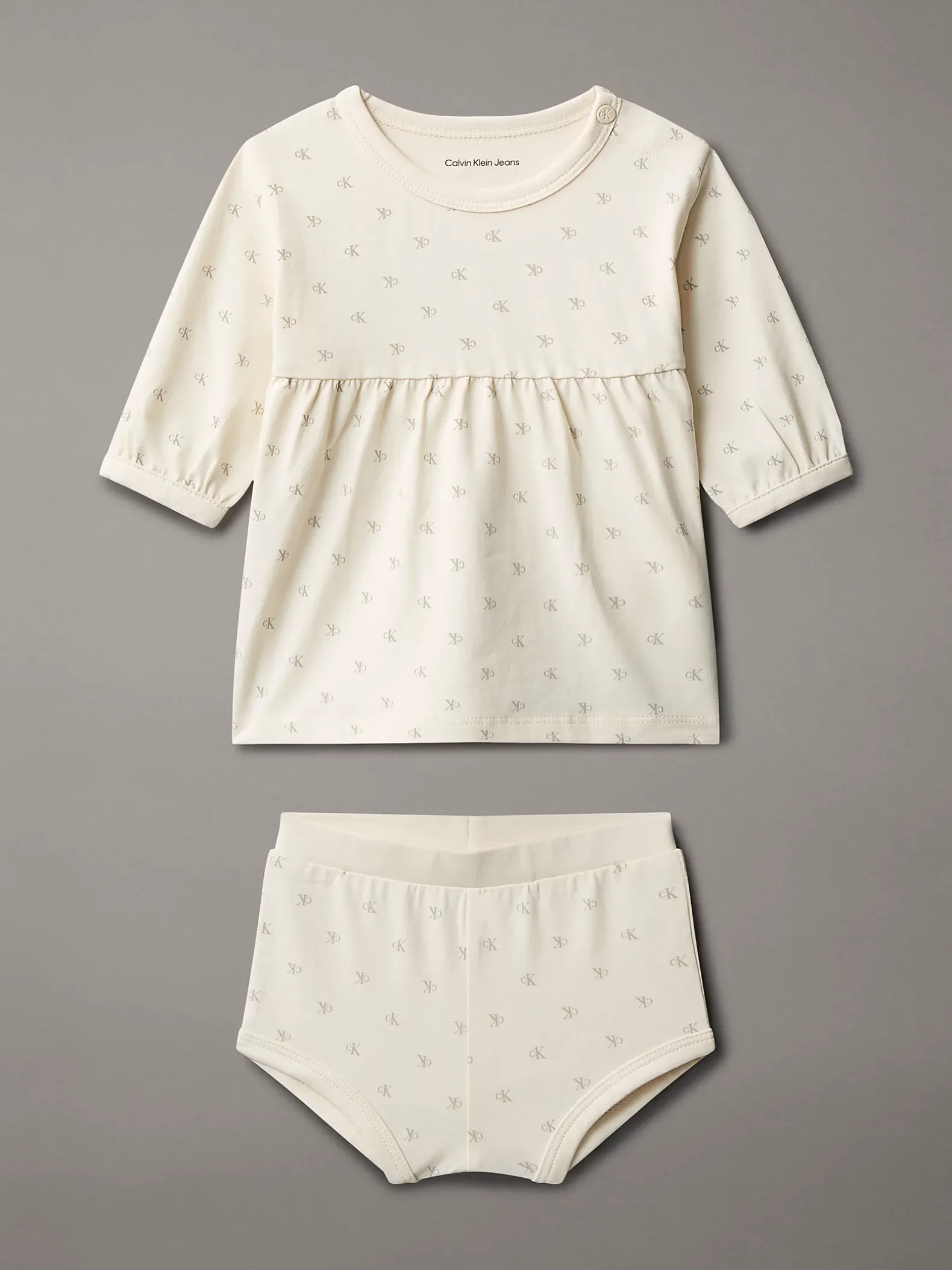 Newborn jurk met logo