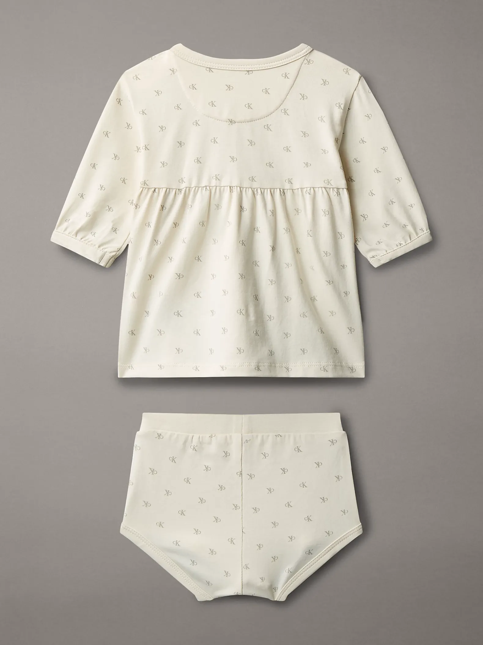Newborn jurk met logo