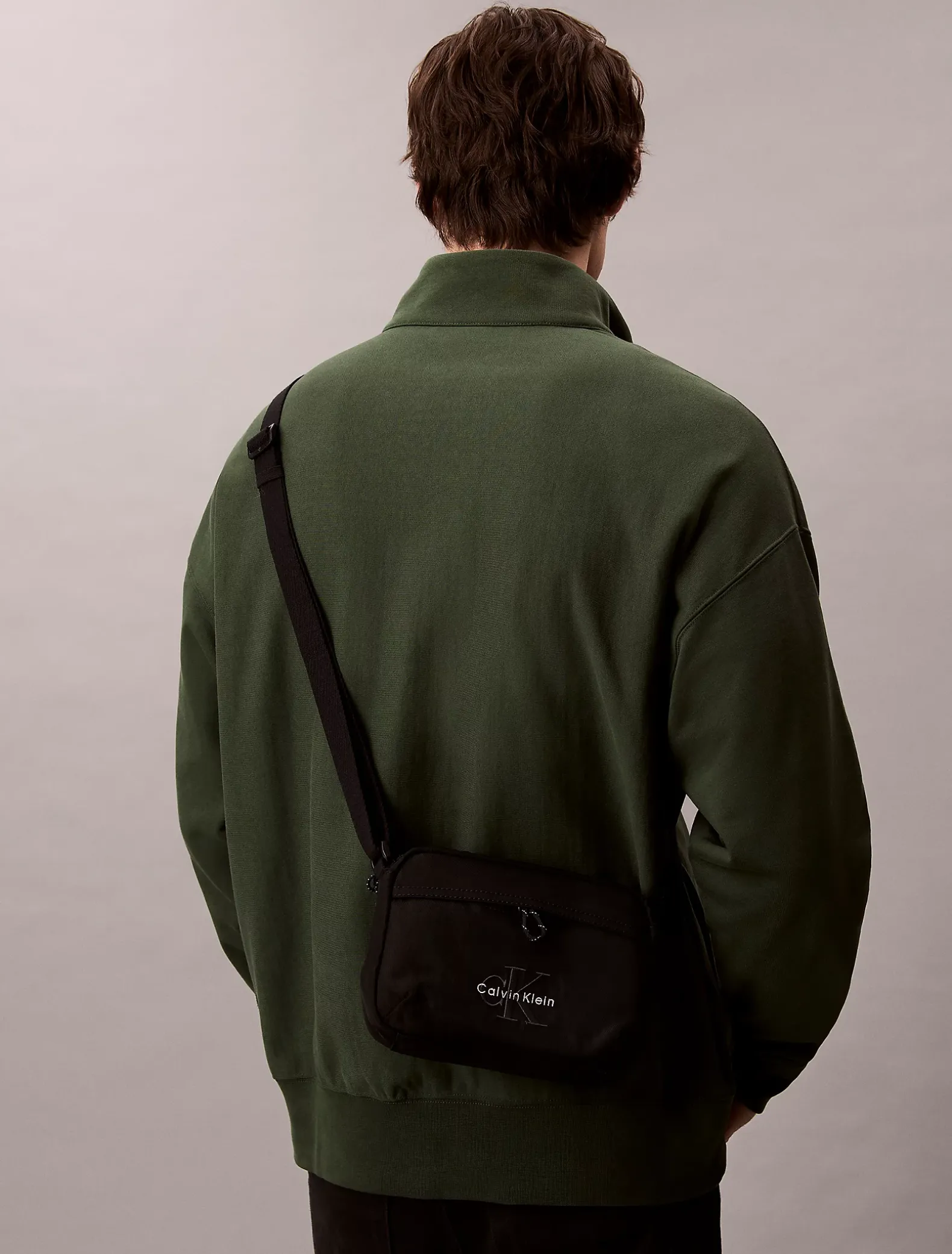 Nylon cameratas met opvallend logo