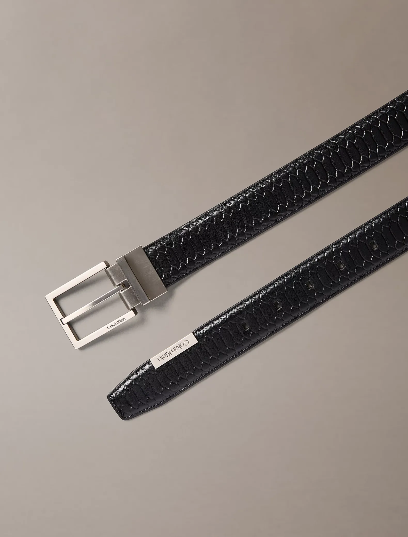 Omkeerbare leren riem met slangeffect