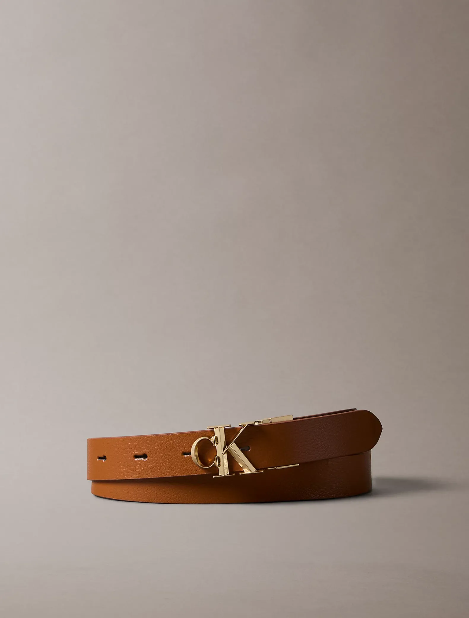 Omkeerbare riem met logo van grof leer
