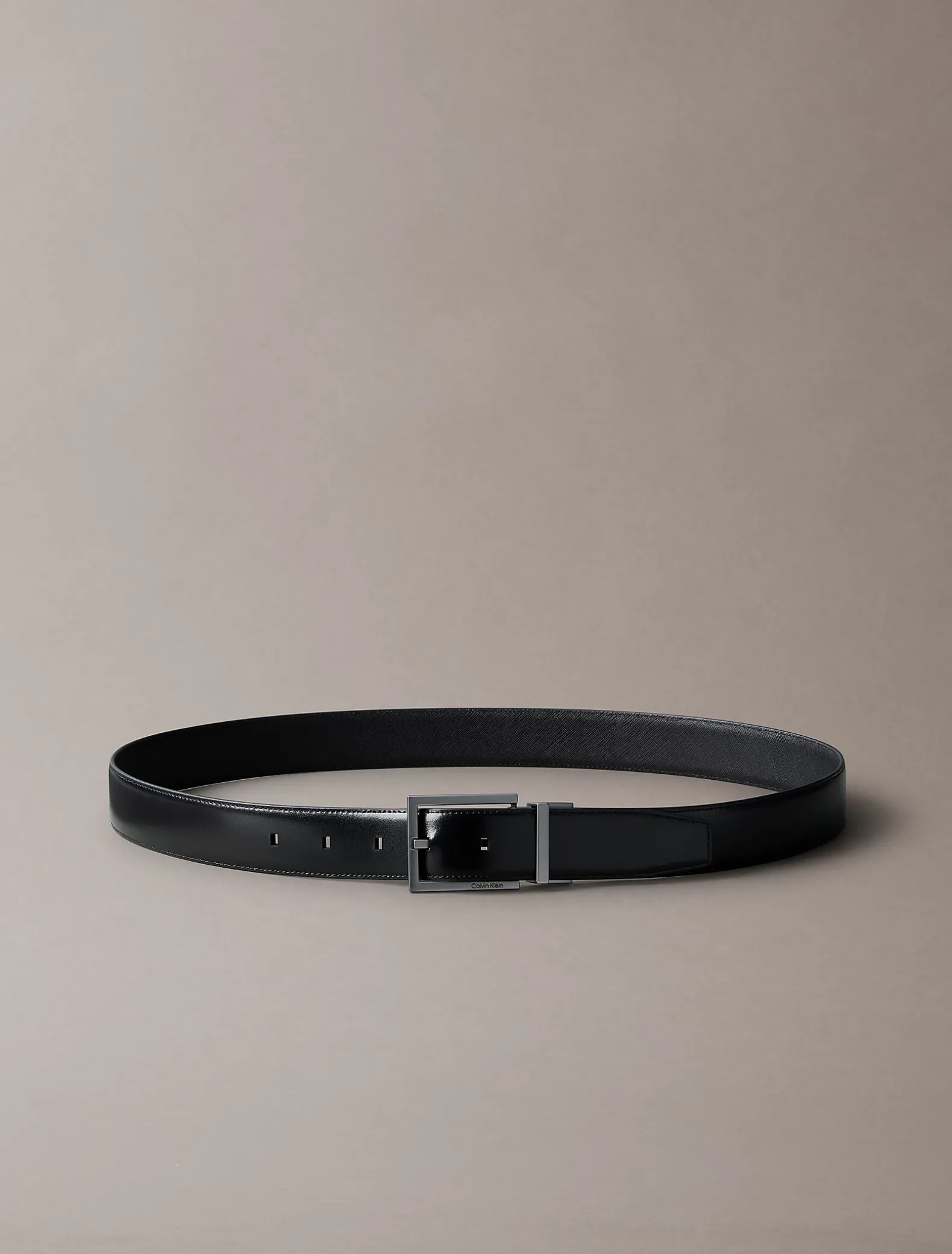 Omkeerbare volnerf leren riem