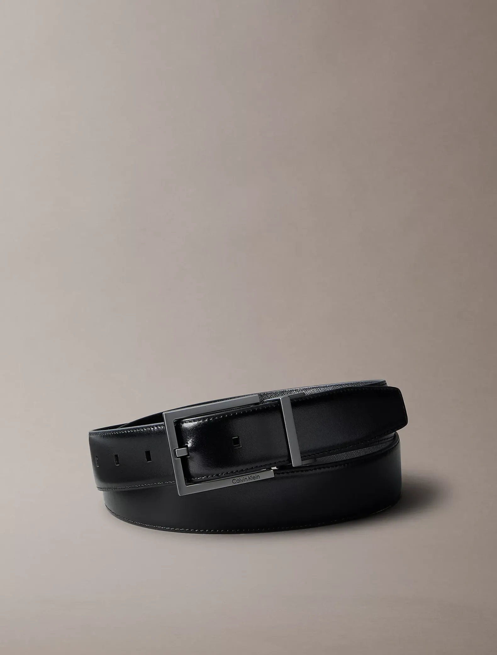 Omkeerbare volnerf leren riem