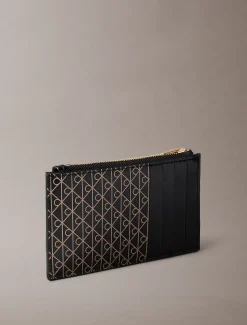 Pashouder met rits bovenop en monogramlogo