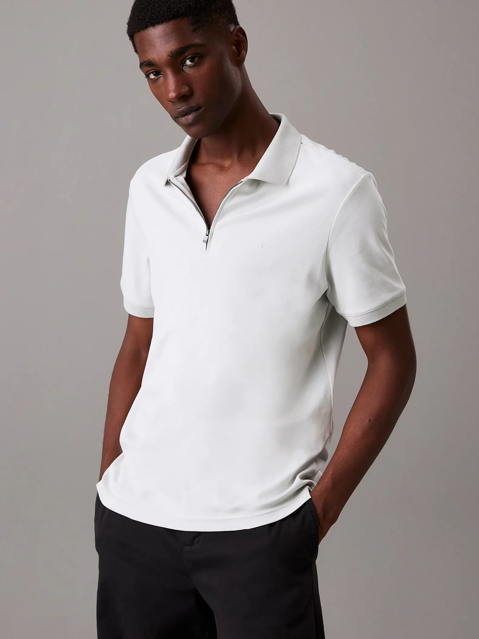 Polo met paspelrits